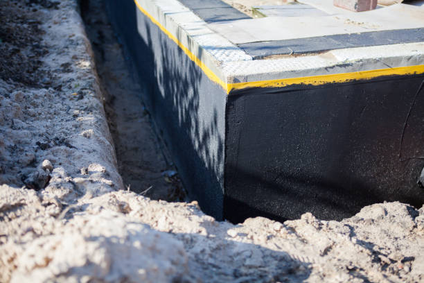 Professional Waterproofing technician working in Dunkirk, NY